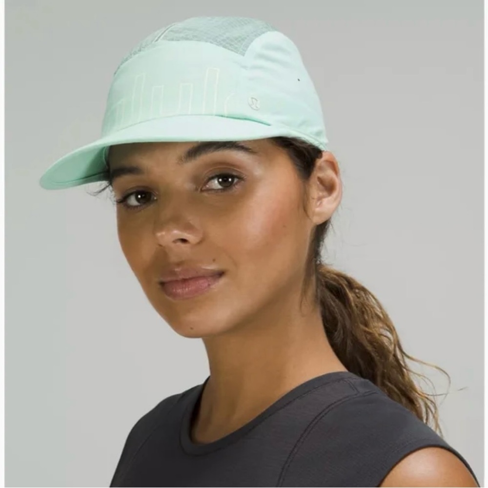 Lululemon L/XL drawstring hiking/running cap. New without tags.